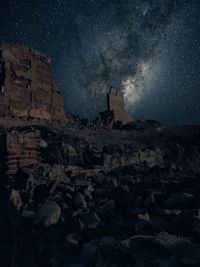 Scenic view of old building against sky at night