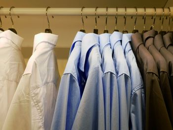 Clothes hanging on rack