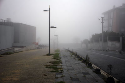 Empty road against sky