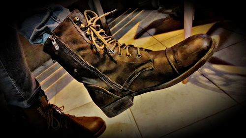 Low section of person wearing shoes