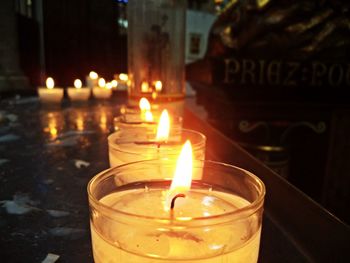 View of glass candles in a row