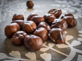 Close-up of chestnuts on table