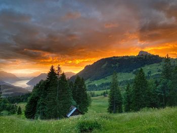 Scenic view of landscape against sky during sunset