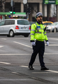 Full length of man standing on street