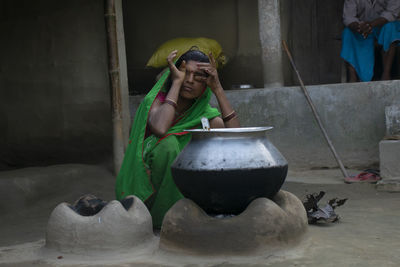 Woman preparing food in kitchen