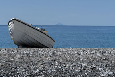 Nautical vessel on sea against sky
