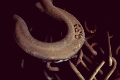 High angle view of rusty metal on wood