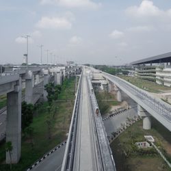 High angle view of bridge in city against sky