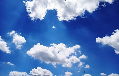 Low angle view of clouds in blue sky