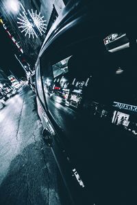 Cars on road in city at night