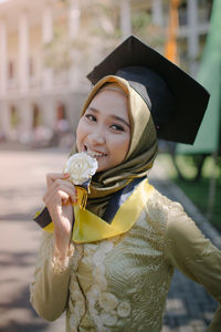 Young girl celebrating graduation