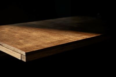 Close-up of cutting board on table