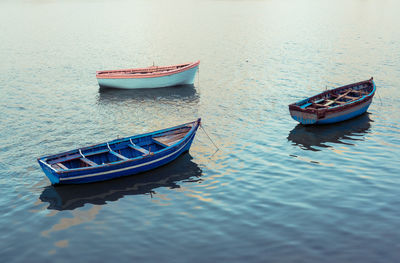 High angle view of boat moored in lake