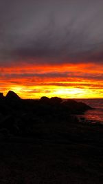 Scenic view of landscape against sky during sunset