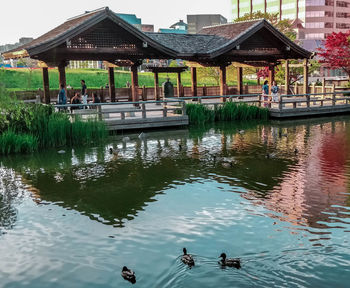 Scenic view of lake and buildings