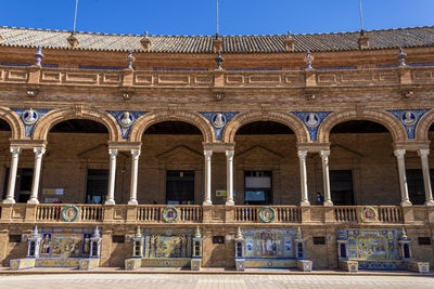 Low angle view of building against blue sky