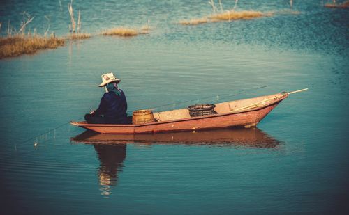 Man fishing in lake