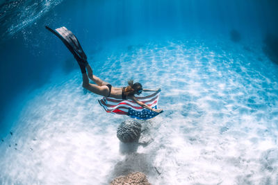 Man swimming in sea