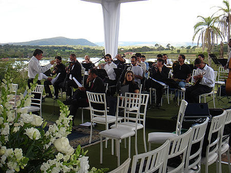 chair, men, leisure activity, lifestyles, person, relaxation, sitting, table, tree, large group of people, grass, mountain, clear sky, day, vacations, sunlight, sky, outdoors, casual clothing