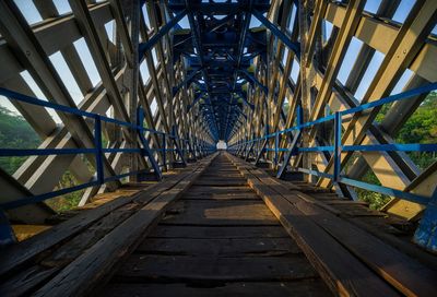 View of footbridge against sky