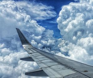 Low angle view of airplane flying in sky