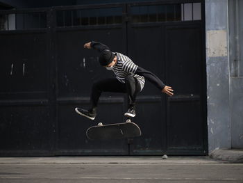 Full length of man jumping outdoors