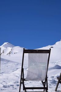 Snow covered mountain against clear sky
