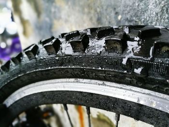 Cropped image of wet bicycle tire