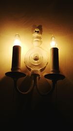 Close-up of lit candle