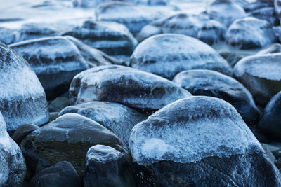 Close-up of stones on beach