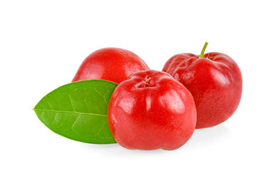 Close-up of strawberry over white background