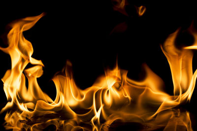 Close-up of illuminated fire at night