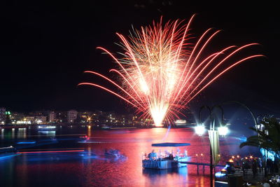 Firework display at night