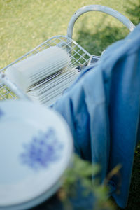 High angle view of wicker basket on field