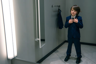 Full length of man looking at camera