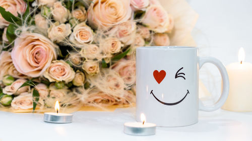 Close-up of roses on table