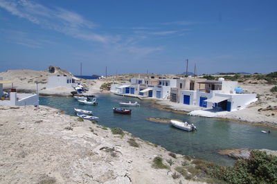 High angle view of boats moored on sea against sky