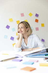 Portrait of businesswoman working at office