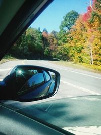 Road seen through car windshield