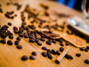 Close-up of coffee beans on table