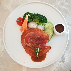 High angle view of fish served in plate on table