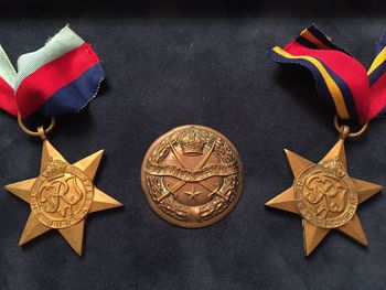 Close-up of medals on table