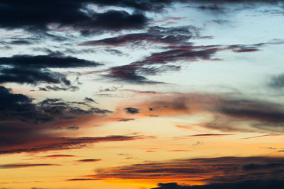 Low angle view of dramatic sky during sunset