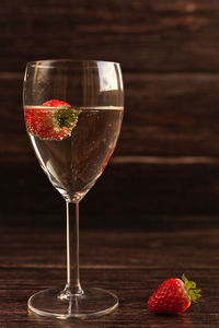 Close-up of wineglass on table