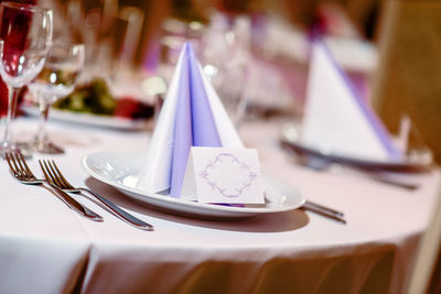 Place setting on table at wedding