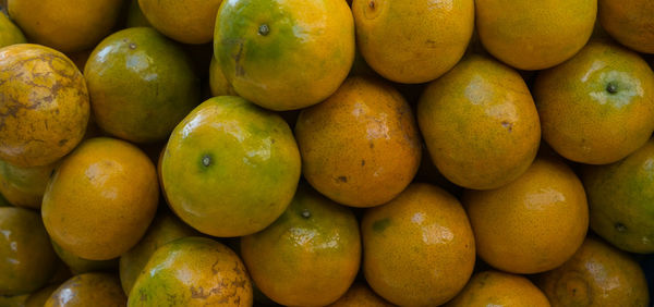 Full frame shot of oranges for sale in market