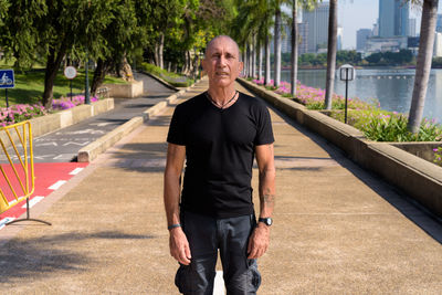 Portrait of man standing outdoors