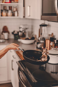 Midsection of food in kitchen at home