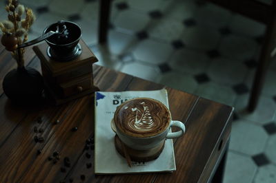 High angle view of coffee cup on table