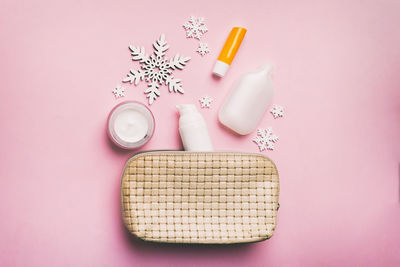 High angle view of pills and medicines on yellow background